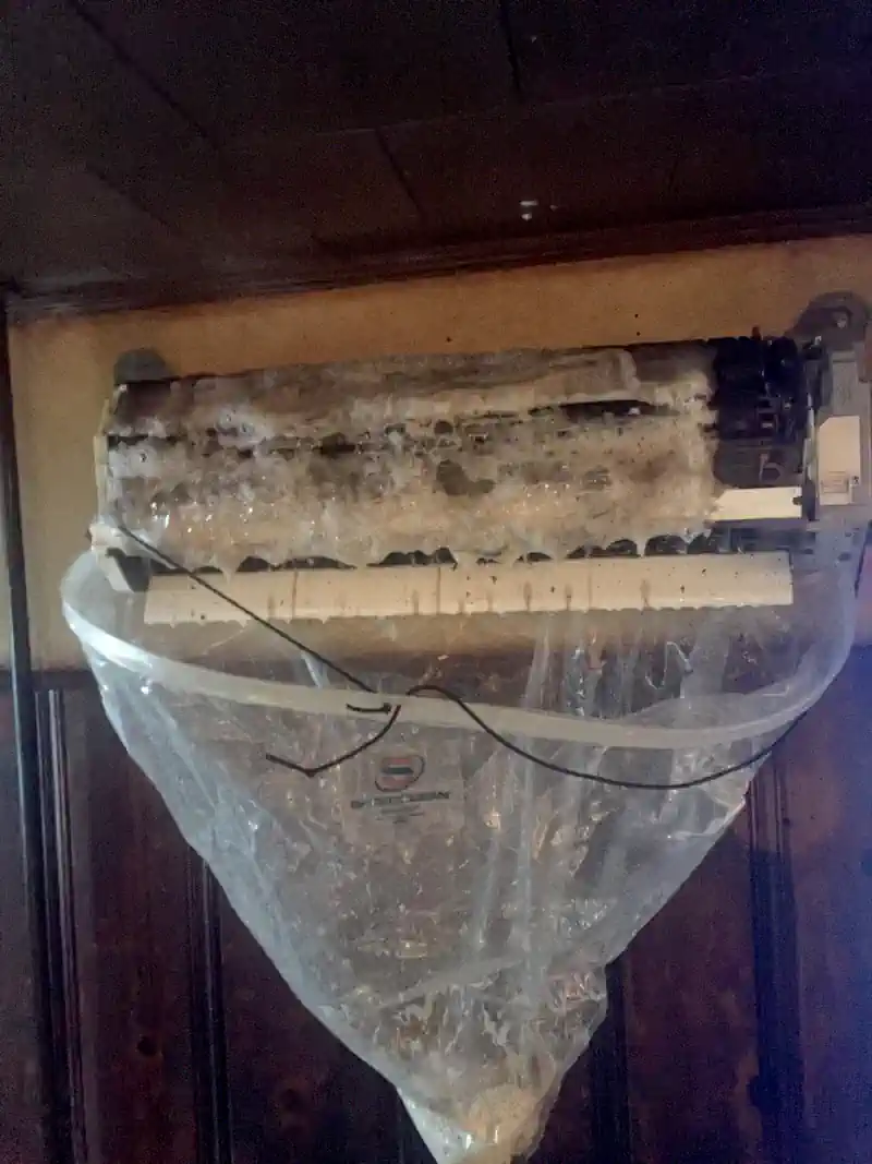 Foam applied to a ductless air system during cleaning.